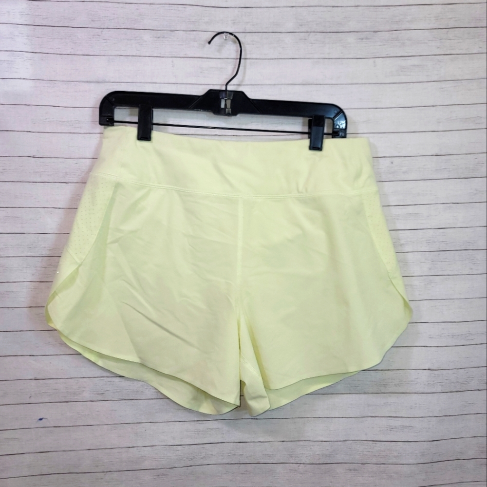 Athleta Women's Athletic Shorts in Light Yellow. Sz M. Run with it.